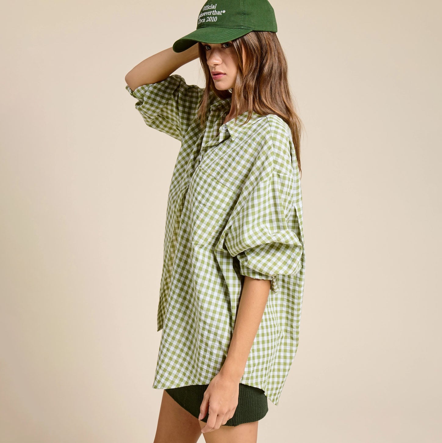 Oversized Gingham Buttom Down in Leaf shown on model on plain background.
