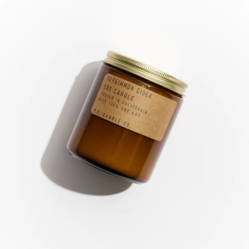 Brown jar of PF Candle Persimmon Cider Candle on a white background