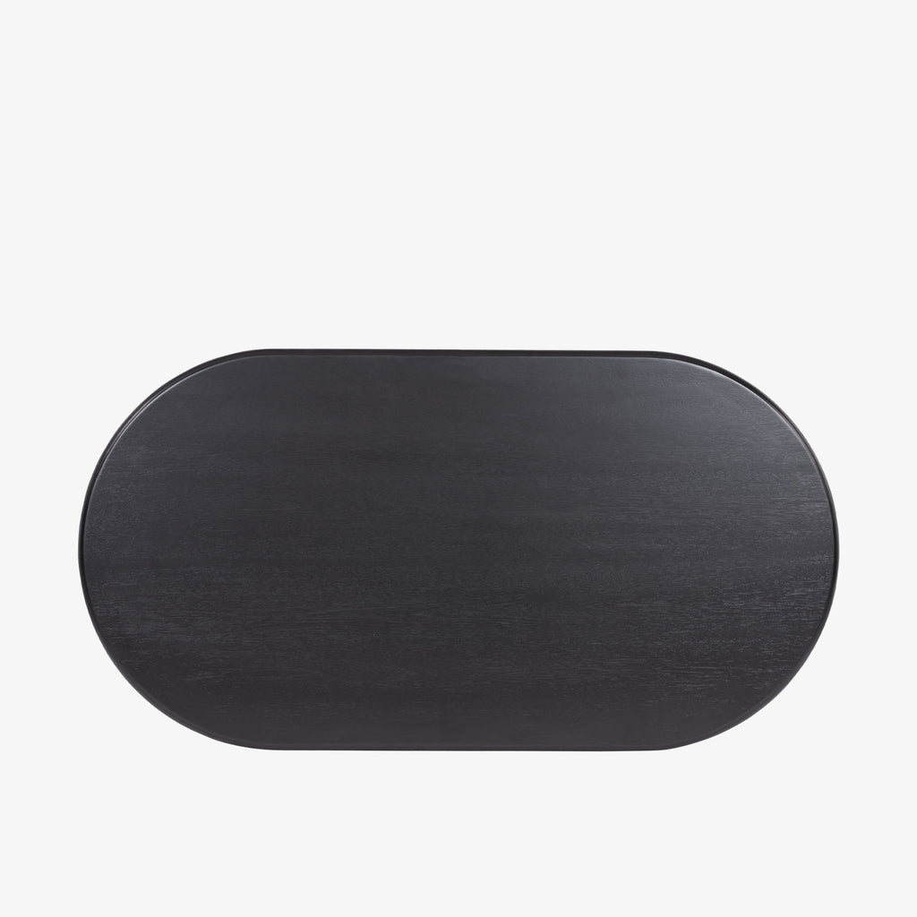 Four Hands Paden Coffee Table in Aged Black Acacia on a white background