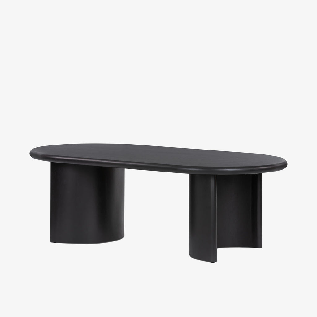 Four Hands Paden Coffee Table in Aged Black Acacia on a white background