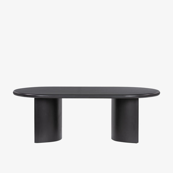 Four Hands Paden Coffee Table in Aged Black Acacia on a white background