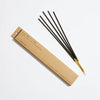 PF Candle pinon incense sticks and brown craft box on a white background