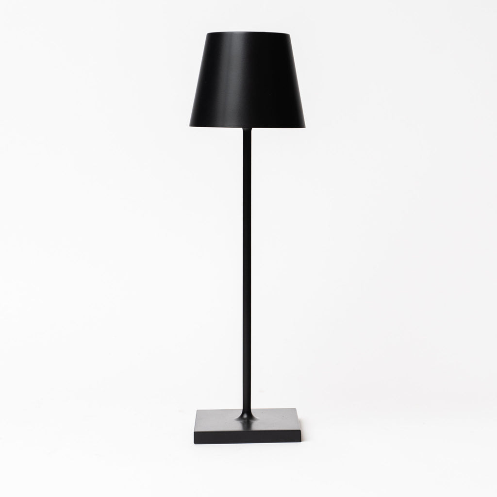 Poldina Pro Table Lamp in Black on a white background