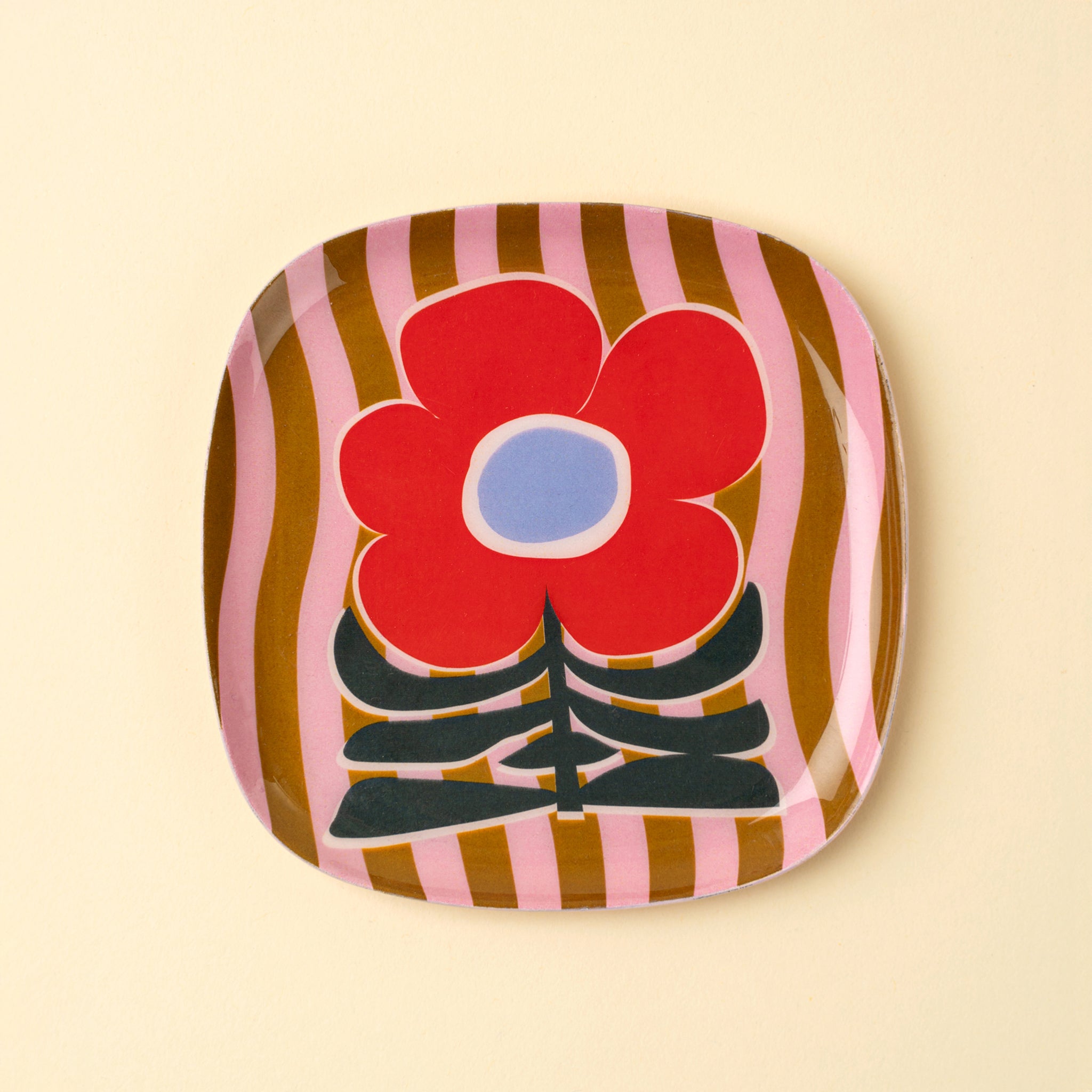 Poppy Pattern Enameled Tray on a beige background at Addison West
