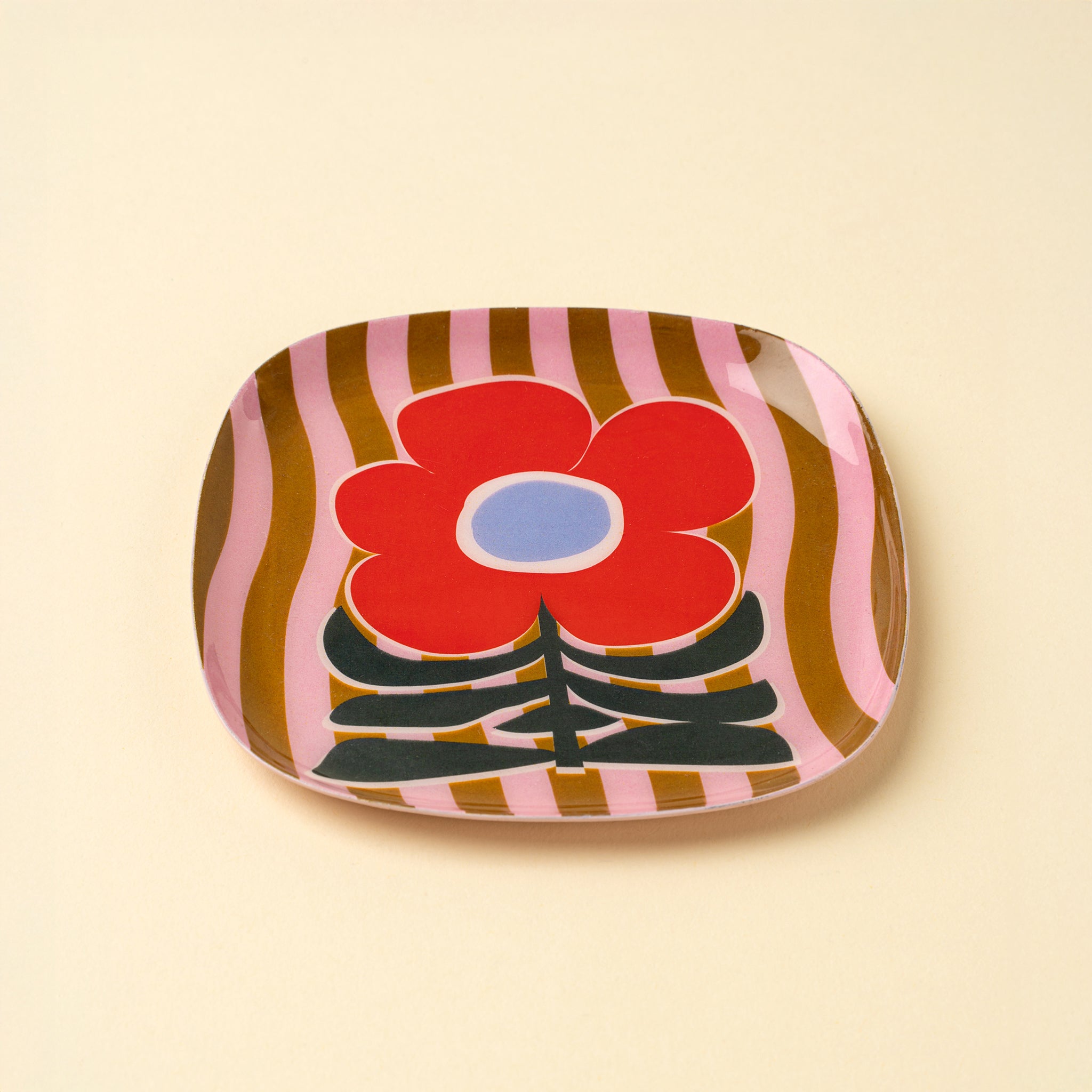 Poppy Pattern Enameled Tray on a beige background at Addison West