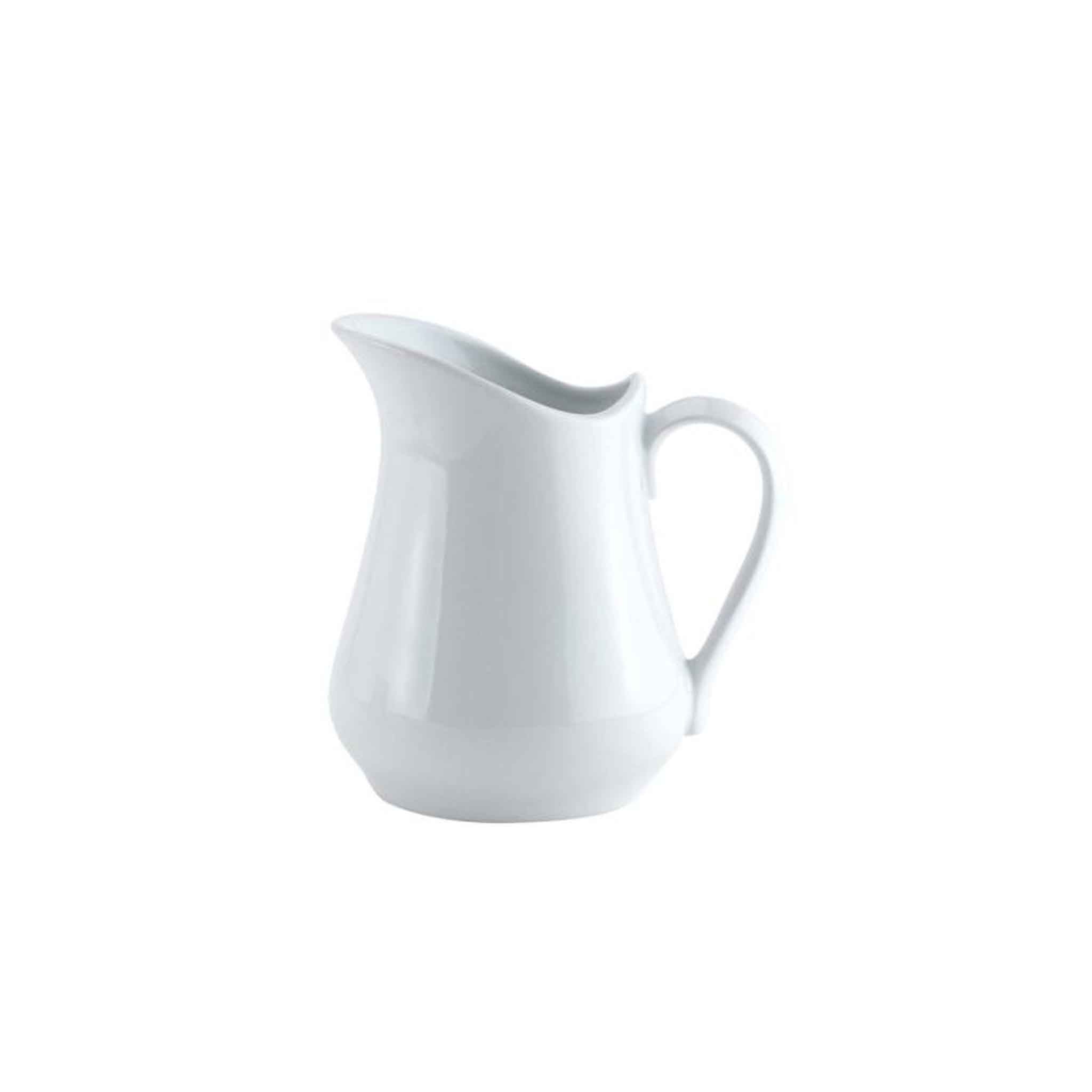 A white porcelain creamer pitcher with a handle and spout, against a plain background.