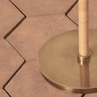 Close up of Delphine Floor Lamp on a red  background at Addison West