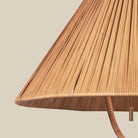 Close up of Delphine Floor Lamp on a beige background at Addison West