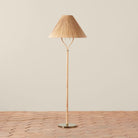 Delphine Floor Lamp on a beige background at Addison West