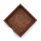 Caspari square rattan cocktail napkin holder from above on a white background