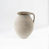 White terracotta urn with handle on a white background