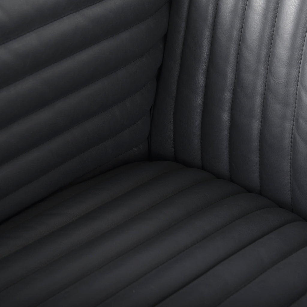 Close up of Ricciardo ribbed Black Leather Wrapped Three Seater Sofa 