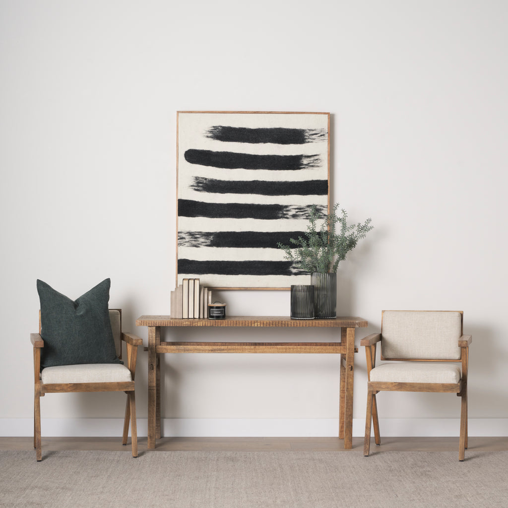 Rosie Small Brown Wood Console Table in a living room with two chairs and a painting on the wall