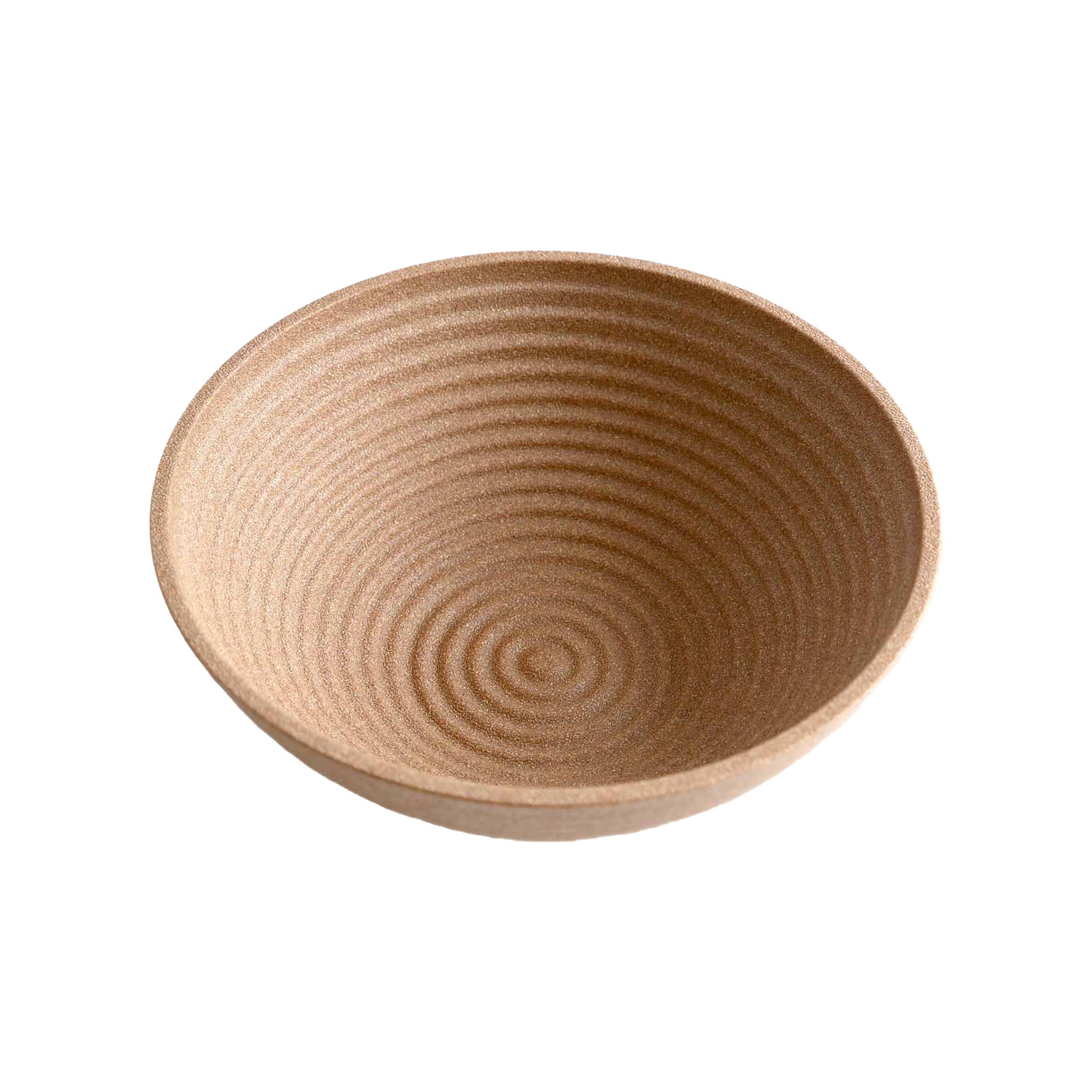 Wooden banneton with concentric circle pattern on a white background