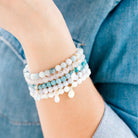 Royal Gemstone Beaded Bracelet in Green Turquoise on a model at Addison West 