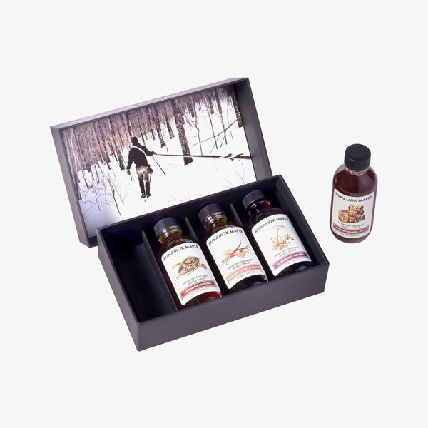 Runamok Vermonter's Collection Small black gift box with four bottle on a white background