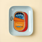 Sardine Enameled Tray on a beige background at Addison West