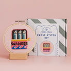 Sardines Cross Stitch Kit on a pink background at Addison West