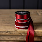 Satin Ribbon in Red, Medium on a wood table at Addison West