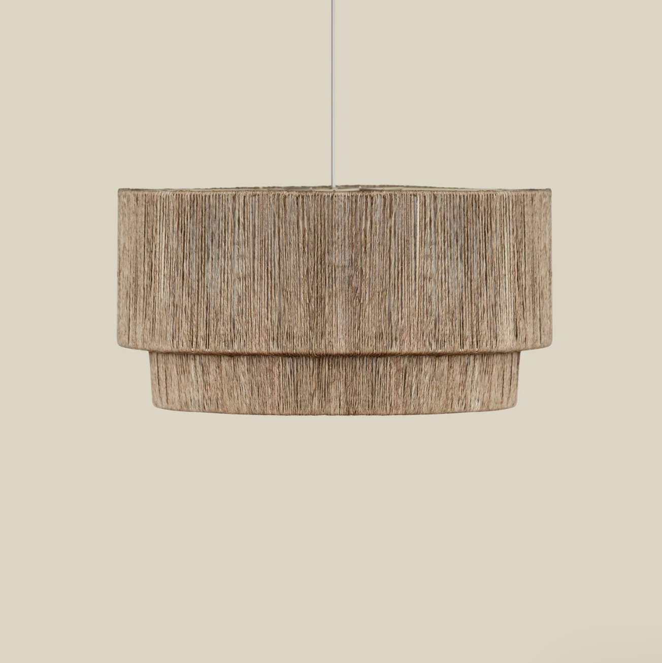 Cocktail 2 Tier Jute Pendant on a beige background at Addison West