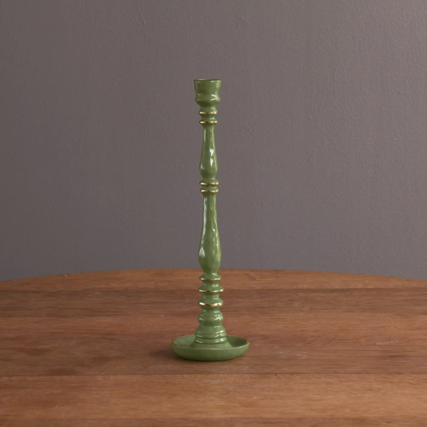 Beatriz Ball Medium Encanto Candlestick Holder in Leaf Green on a table at Addison West