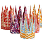 Colorful paper crowns with geometric patterns on a white background