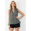 Blond model wearing THML Sleeveless Pleated Top in Teal with black shorts and sandals