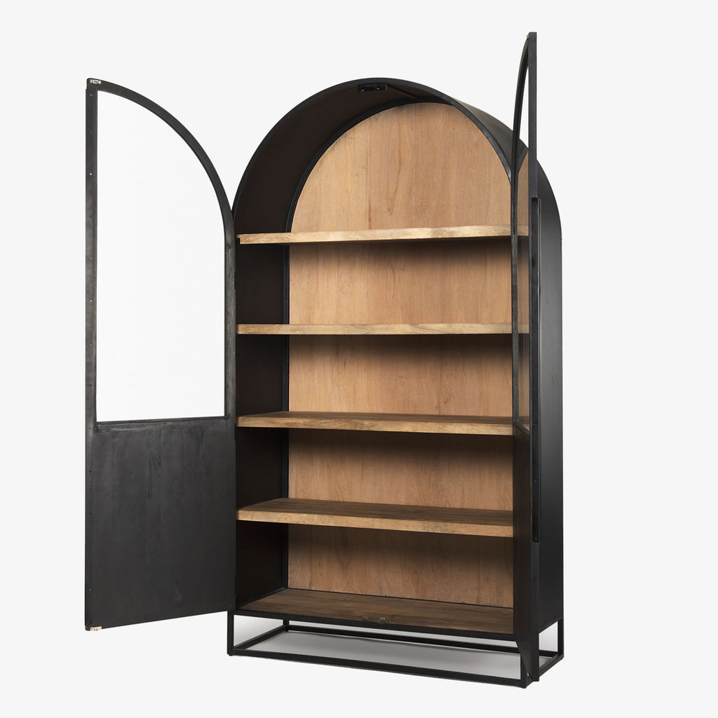 Arched top black wood cabinet with iron base and honey wood interior on a white background