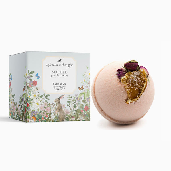 Soleil Bath Bomb and box by a pleasant thought brand on a white background