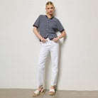Striped Short Sleeve Button Cardigan in Navy shown on model on plain background.