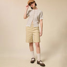 Striped Short Sleeve Button Cardigan in Taupe shown on model on plain background.