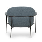 Back of Suerte Chair in Knoll Sky on a white background