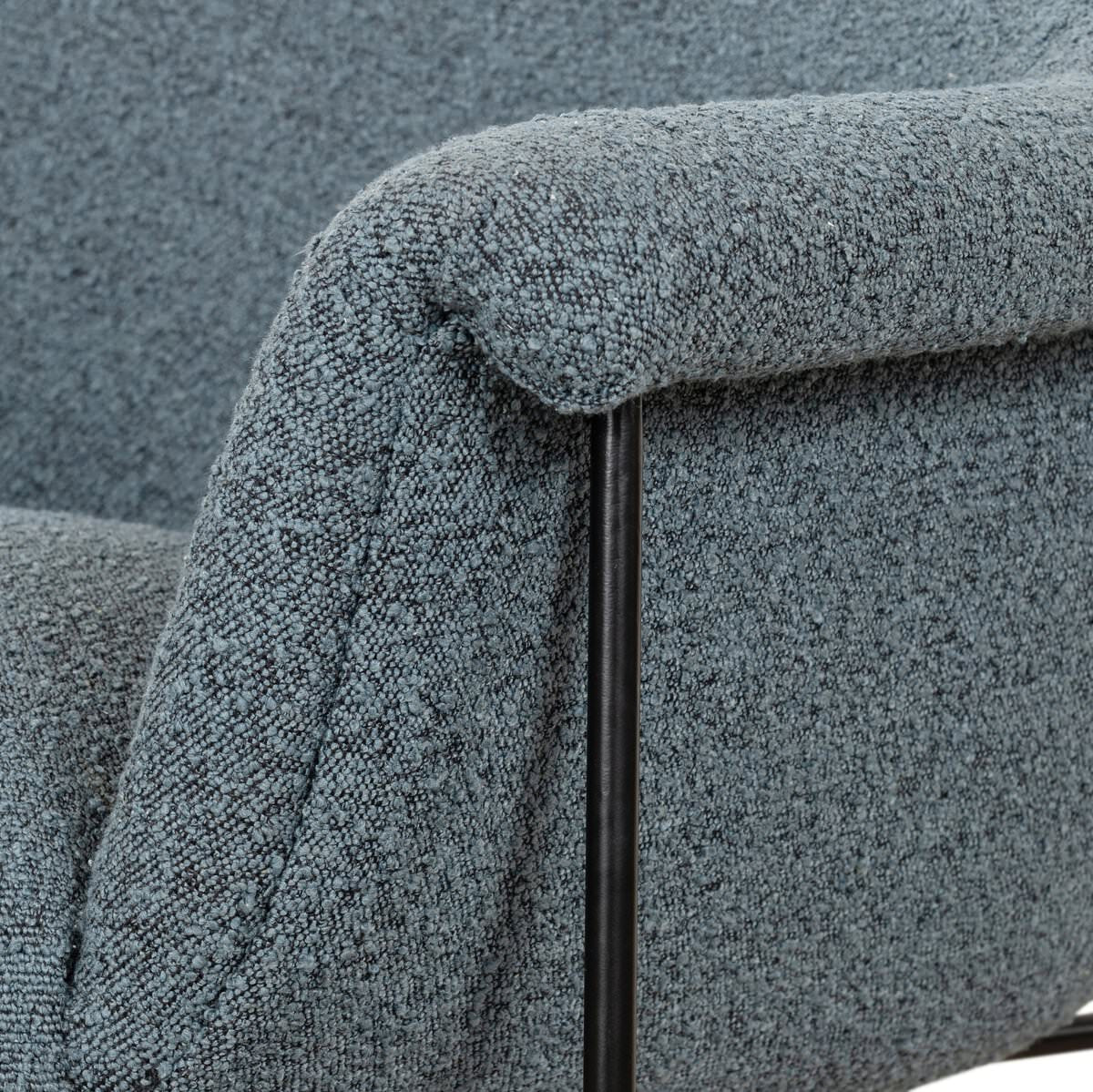 Close up of Suerte Chair in Knoll Sky on a white background