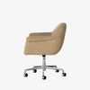 Four Hands Suerte Desk Chair in Camel Sheepskin on a white background