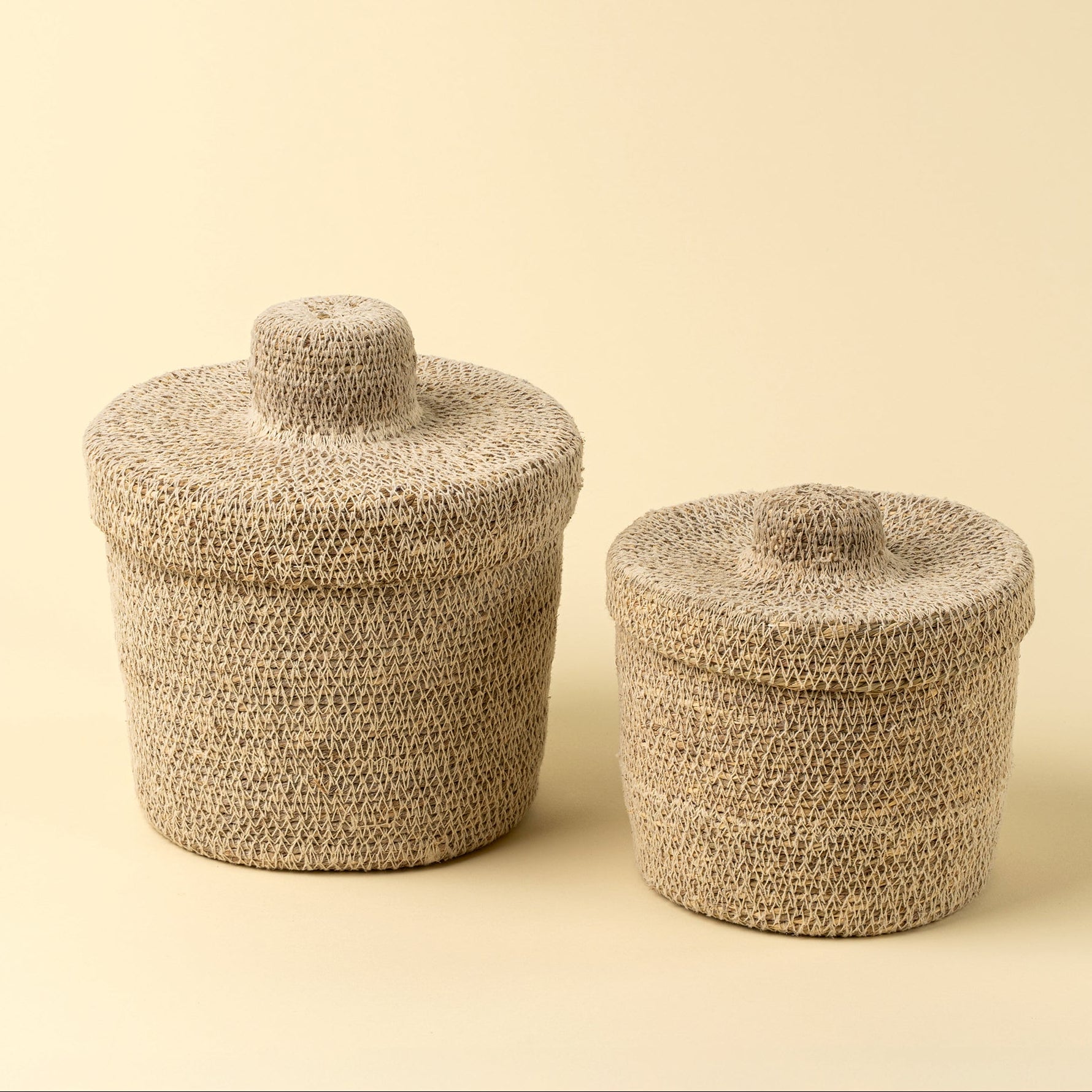 Tajine Seagrass Basket on a beige background at Addison West