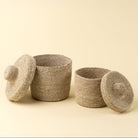 Tajine Seagrass Basket on a beige background at Addison West