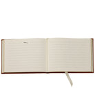 Tan Leather Bound Guest Book on white background at Addison West.