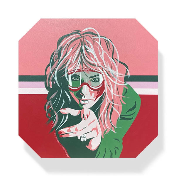 Square coaster with illustration of Taylor Swift wearing ski goggles by Shannon Henn on a white background