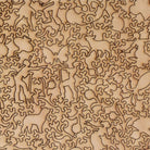 Liberty Puzzle Tea Break wood puzzle pieces on a white background at Addison West