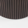 Close up of Terra Dark Brown Wood Round Fluted Dining Table on a white background