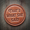 That's What She Said Leather Coaster on a wood surface