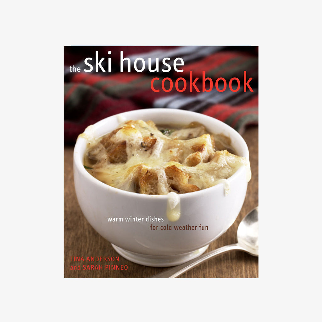 Front cover of ski house cookbook with bowl of french onion soup on a white background