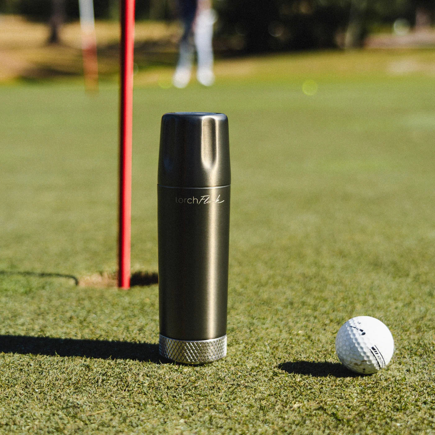 High Camp 9 oz. Torch Flask in Onyx the ground at Addison West