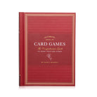 Red front cover of Ultimate Book of Card Games on a white background