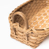 Close up of Vermont made rattan bread basket on a white backrgound