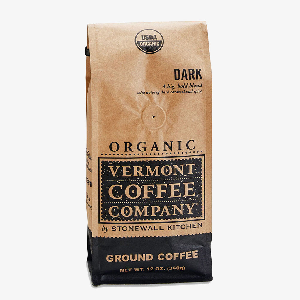 Vermont Coffee Company Dark Ground Coffee in a brown and black bag on a white background