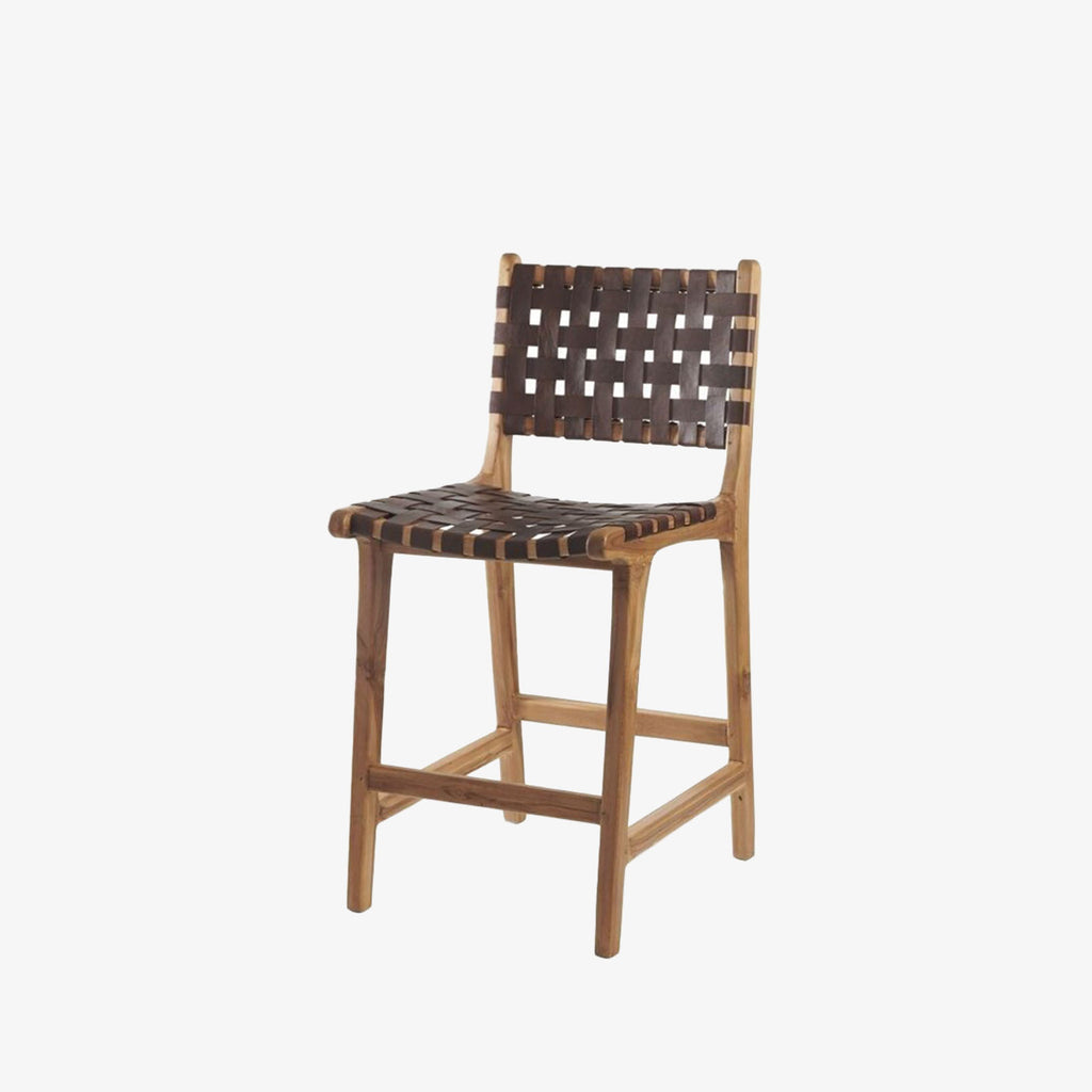 Teakwood counter chair with woven leather seat and back on a white background