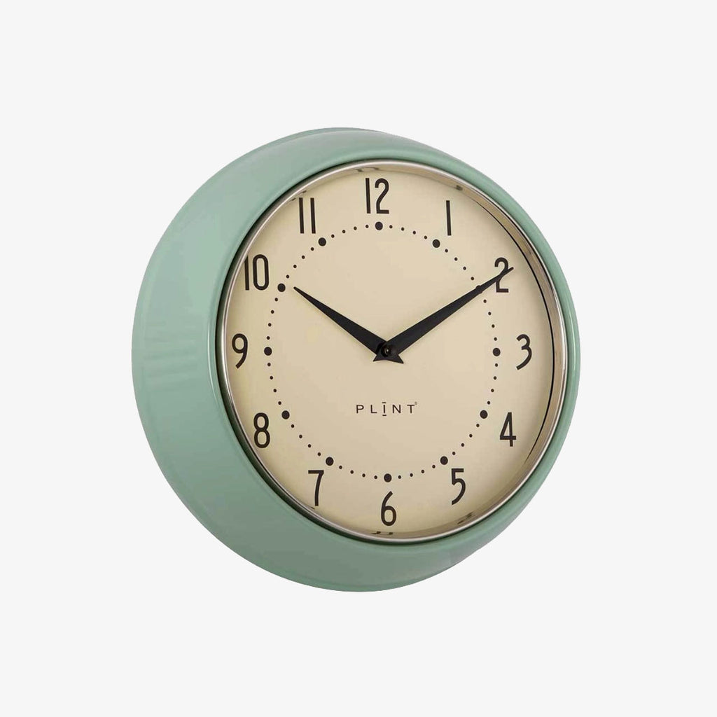 Classic Wall Clock in leaf green with white face and black numbers