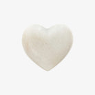 White marble heart on a white background