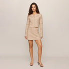 Z Supply Cressa Cardigan in Natural shown on model on plain background.
